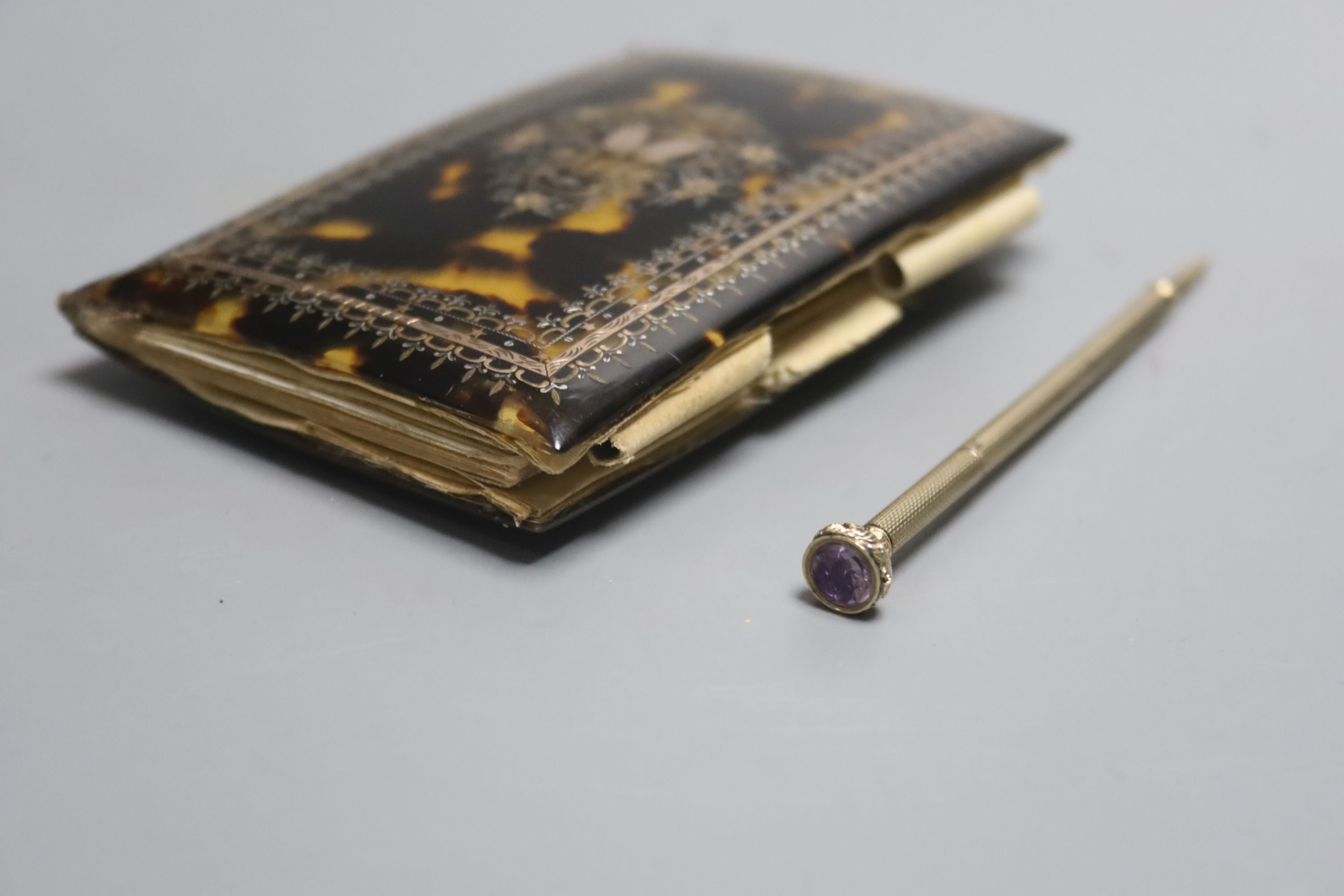 A 19th century French tortoiseshell and gilt metal inlaid aide memoire